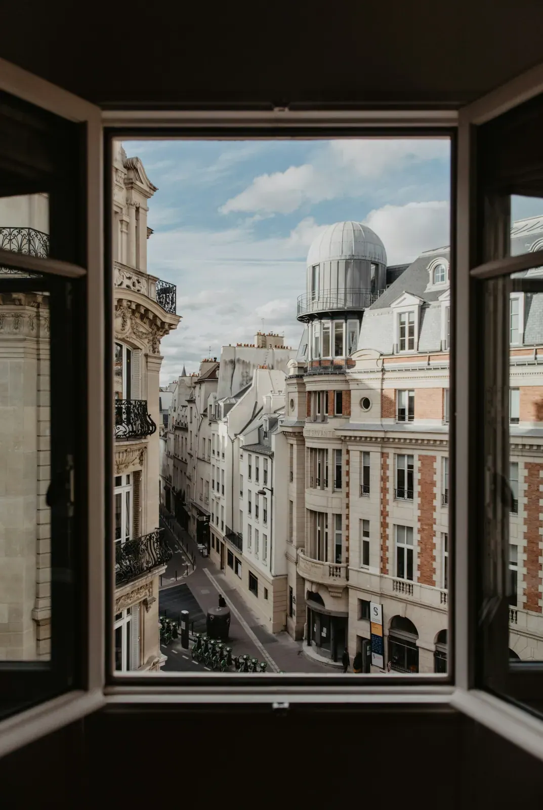 A Paris street seen from an open window
